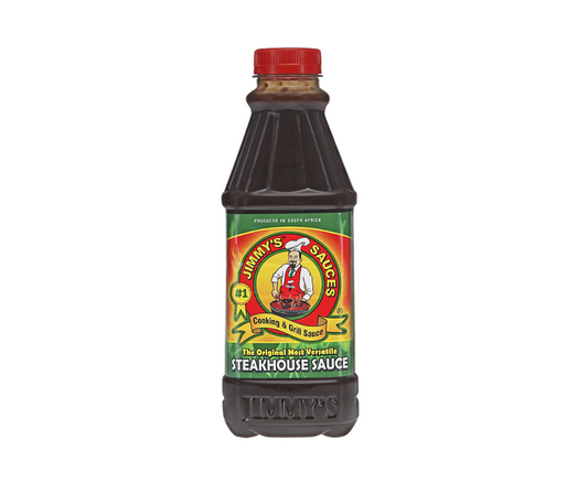 Bottle of steakhouse sauce with a colorful label on a white background