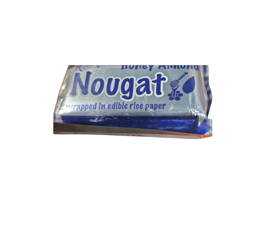 Packaged nougat bar with blue and white design on a white background